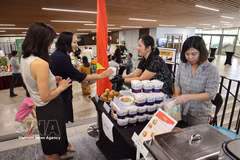 越南代表团的美食展位。图自越通社