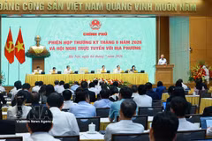 会议场景。图自越通社