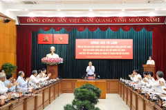 工作会谈现场。图自越通社