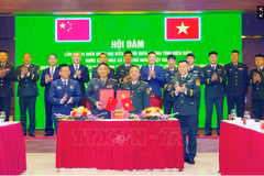 双方合作备忘录签署仪式。图自越通社