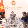 会见现场。图自越通社