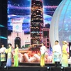 第十二届胡志明市奥黛节精彩开幕。图自越通社