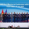 各国代表合影。图自越通社