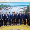 双方代表合影留念。图自越通社