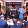 会见现场。图自越通社