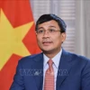 越南外交部常务副部长、越南UNESCO国家委员会主席阮明宇。图自越通社