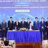 签署仪式现场。图自越通社