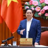 越南政府总理范明政发表讲话。图自越通社