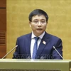 越南财政部长阮文胜在会上发表讲话。图自越通社