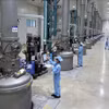 越南晶澳太阳能有限公司的太阳能电池生产原料生产线。图自越通社
