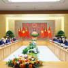 会谈现场。图自越通社