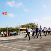 第六号工作代表团出席长沙岛升旗仪式和阅兵式。图自越南海军报