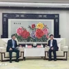 吴文俊会见重庆市市长胡衡华。图自越通社