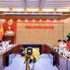工作会谈现场。图自越通社