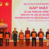 2026年北方少数民族地区威望人士和宗教界人士模范代表见面会。图自越通社