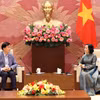 会见现场。图自越通社