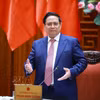 越南政府总理范明政主持召开政府常务会议。图自越通社
