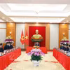 会见现场。图自越通社