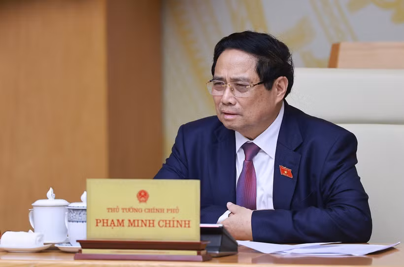 越南总理范明政发表讲话。图自越通社