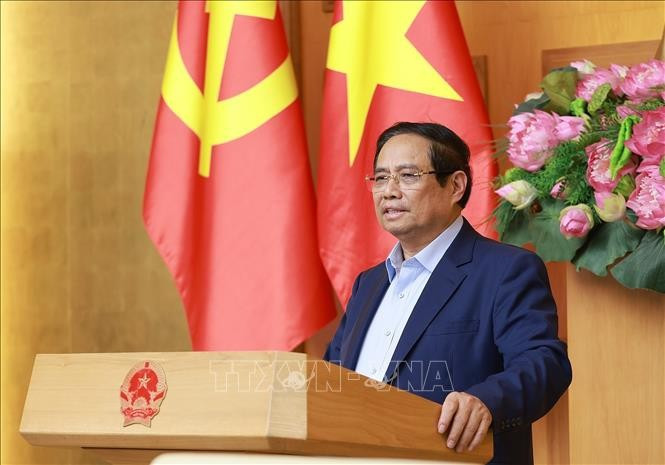 范明政总理发表讲话。图自越通社