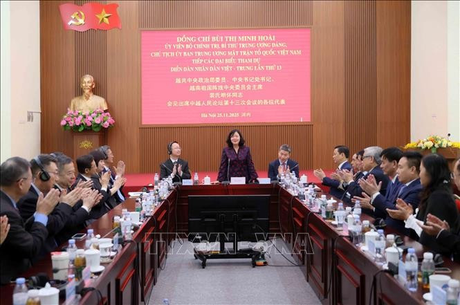 会见现场。图自越通社