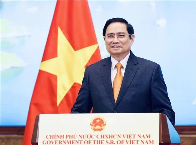 政府总理范明政。图自越通社