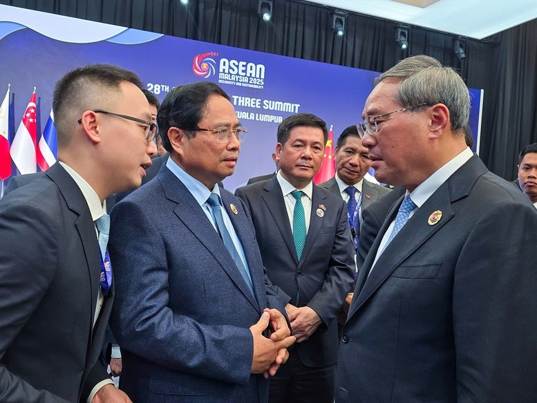 越南政府总理范明政会见中国国务院总理李强。图自越通社