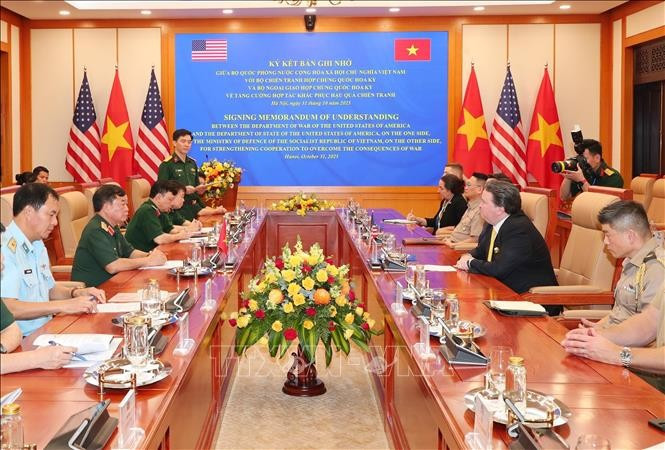 签署仪式现场。图自越通社