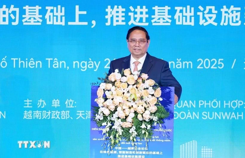 越南政府总理范明政发表讲话。图自越通社