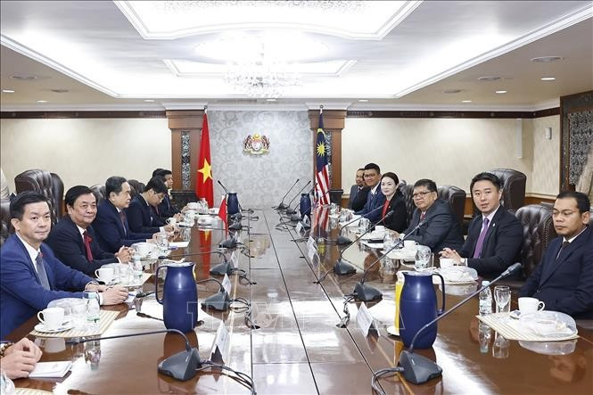 会谈现场。图自越通社