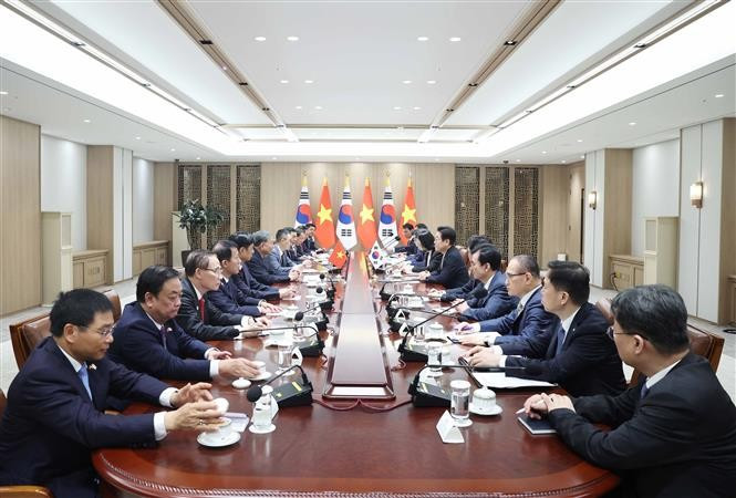 会谈现场。图自越通社