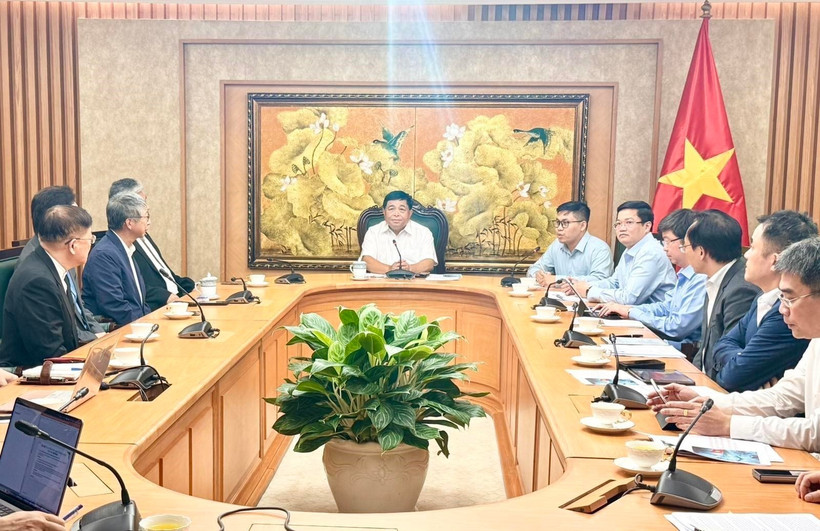 工作会谈场景。图自越通社