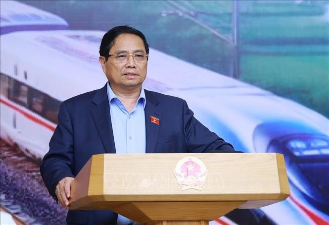 越南政府总理范明政发表讲话。图自越通社