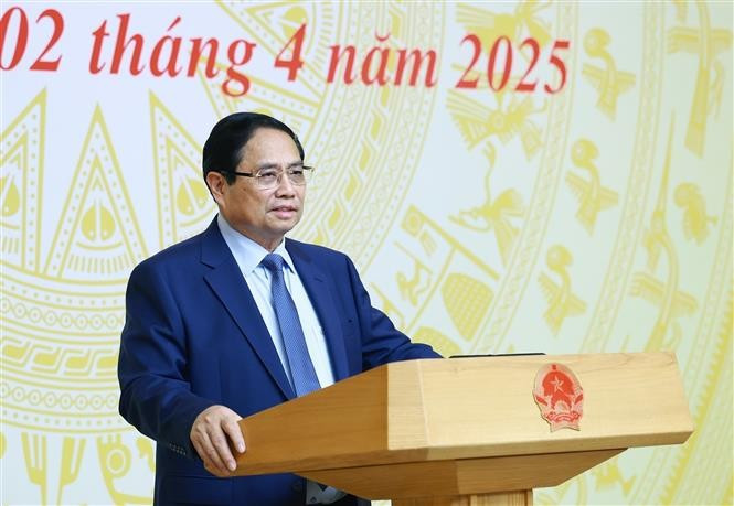 政府总理范明政发表讲话。图自越通社