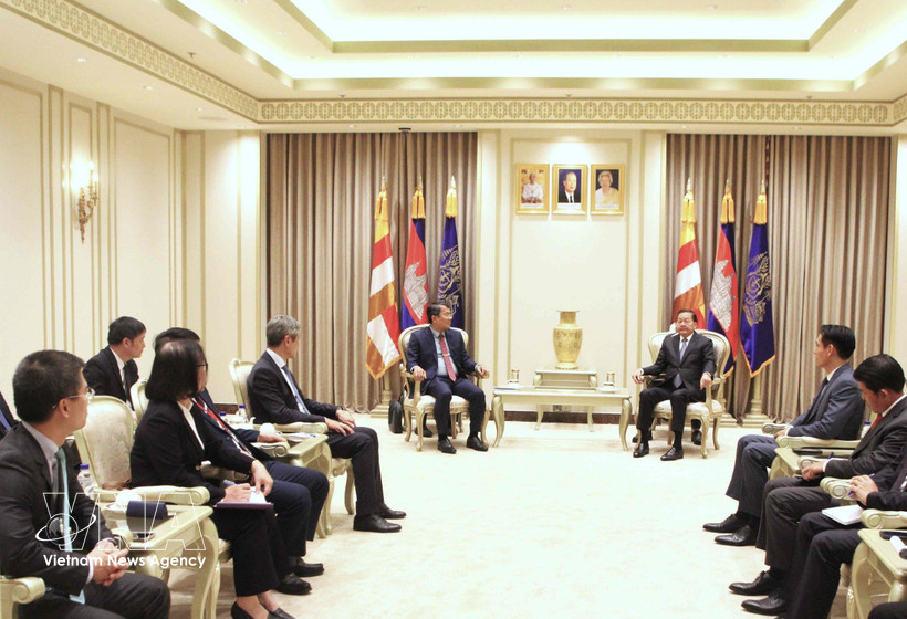 越共中央委员、外交部常务副部长阮明羽在金边拜会了柬埔寨王国第一副首相涅沙文。图自越通社