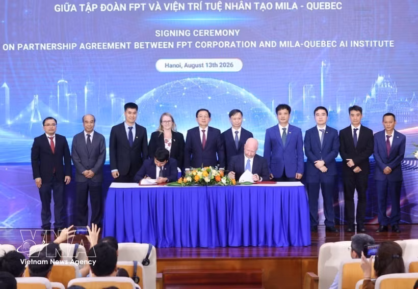 签署仪式现场。图自越通社