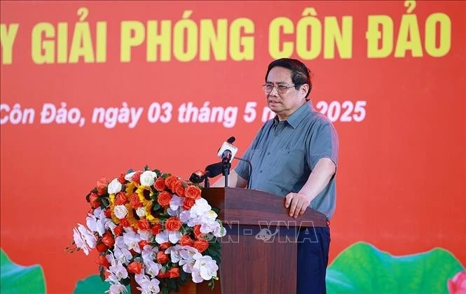 政府总理范明政发表讲话。图自越通社