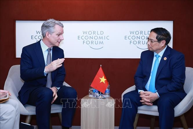 越南政府总理范明政会见德国西门子股份公司管理委员会成员、首席技术官和首席战略官彼得·科尔特。图自越通社