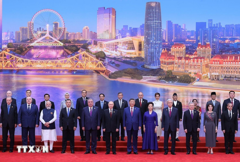 与会代表合影。图自越通社