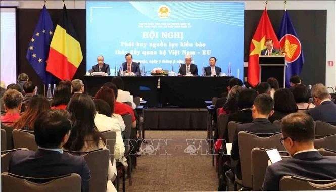 会议场景。图自越通社