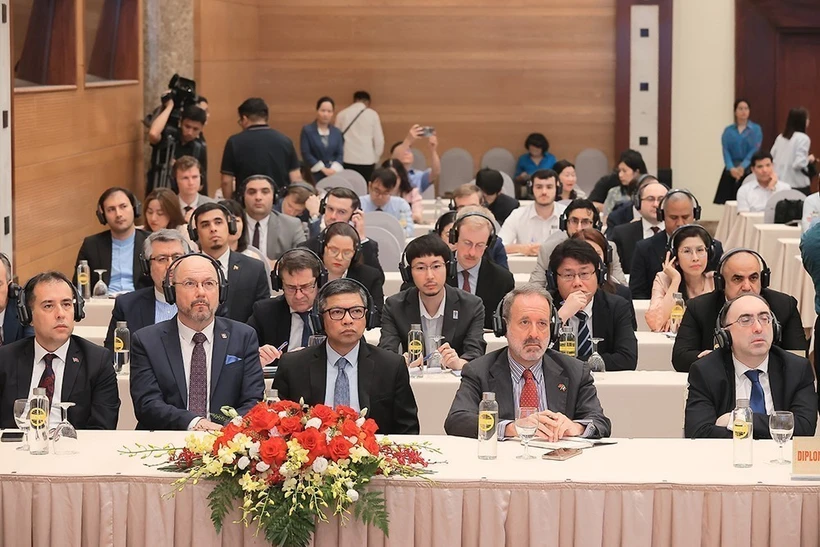 国内外记者出席国际新闻发布会。图自越通社