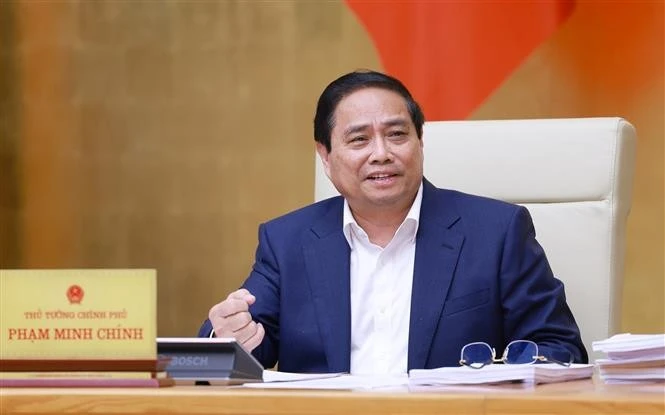 范明政总理发表总结讲话。图自越通社