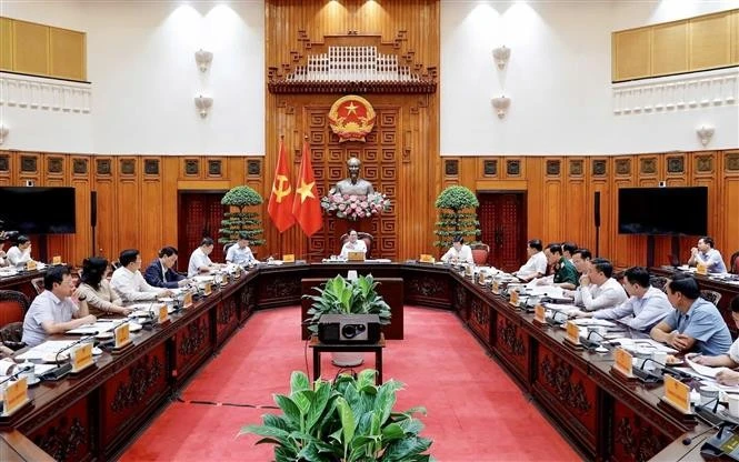 会议场景。图自越通社