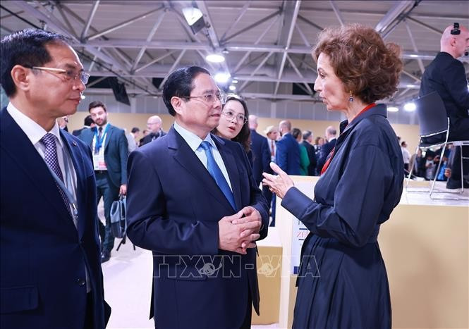 越南政府总理范明政和联合国教科文组织（UNESCO）总干事奥黛丽•阿祖莱。图自越通社
