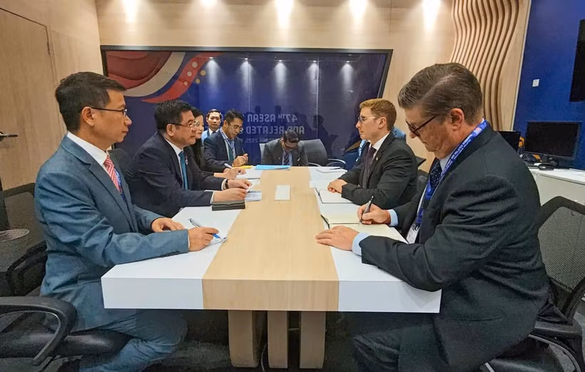工作会谈现场。图自越通社