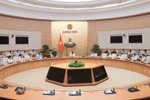 会议场景。图自越通社