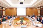会议场景。图自越通社