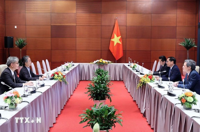 裴青山会见联合国工业发展组织副总干事。图自越通社