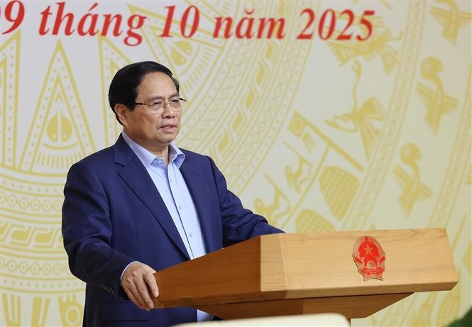 越南政府总理范明政主持全国会议。图自越通社