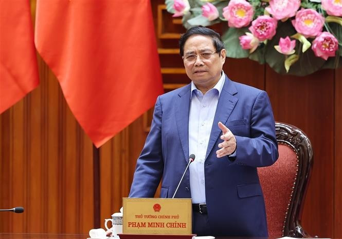 越南政府总理范明政发表讲话。图自越通社